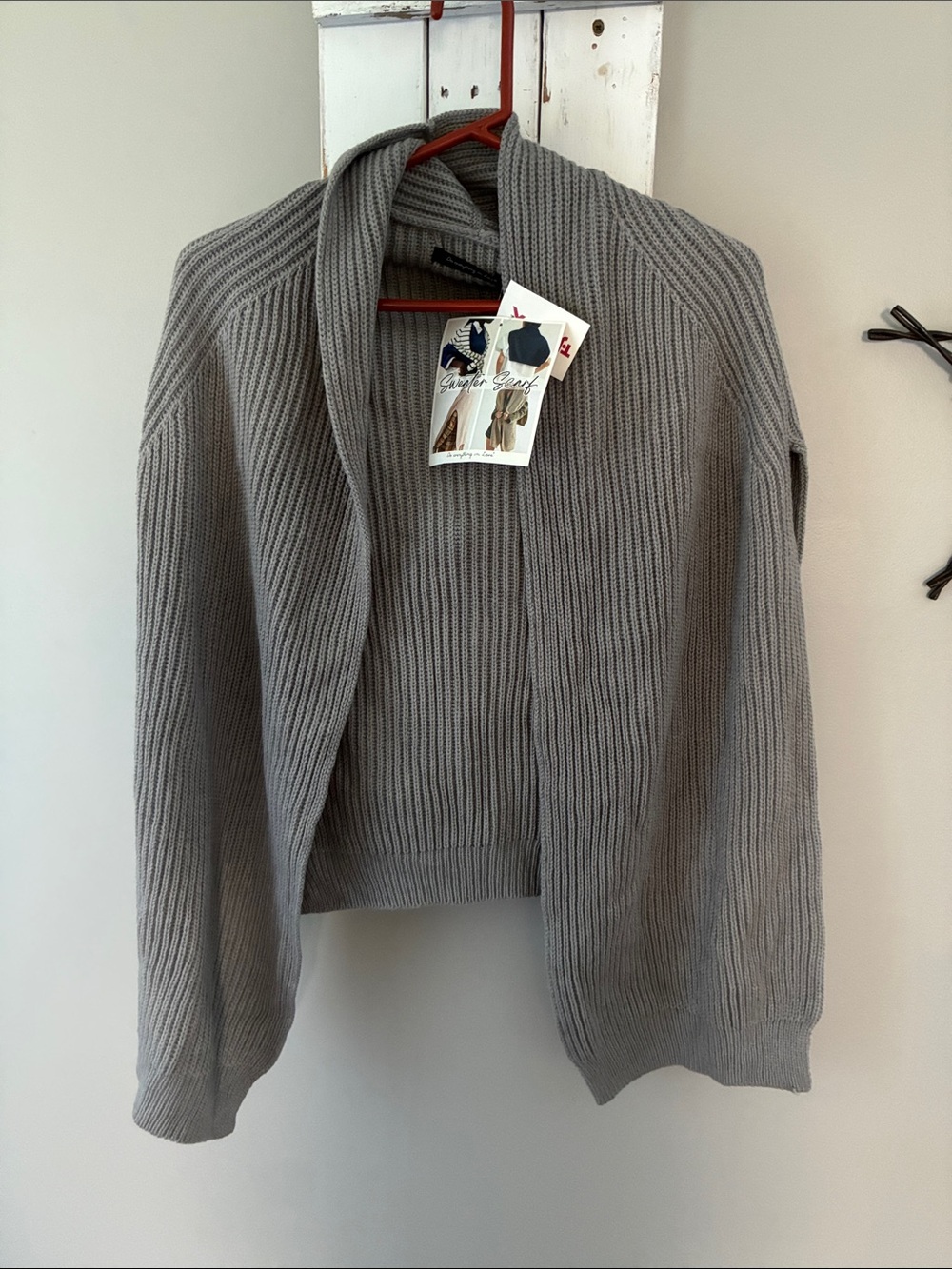 Women’s sweater scarf drape